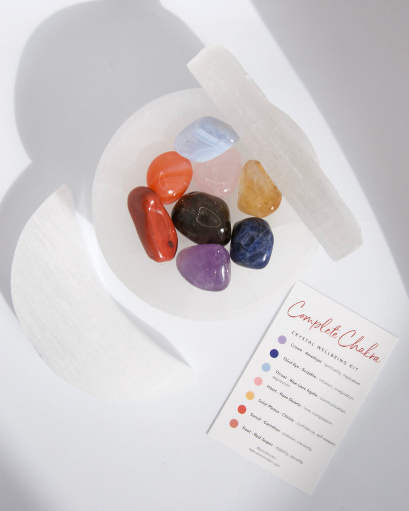 Arora London Complete Chakra Crystal Wellbeing Kit with seven crystal tumblestones and selenite stick 