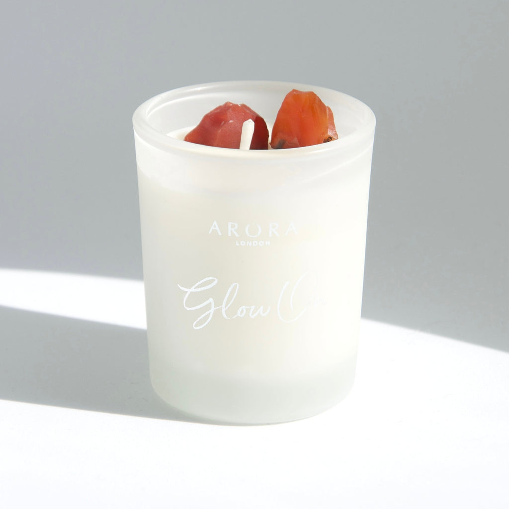 Arora London  Glow On Carnelian Crystal Travel Candle infused with Orange and Ginger essential oils in 9cl frosted glass container